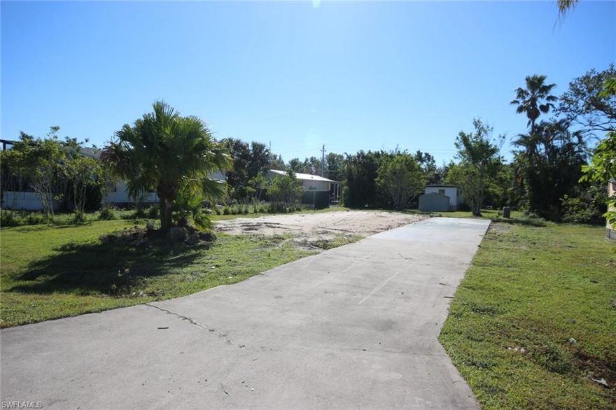 Fantastic home-site available in a terrific 55+ community where you own the land! Riverwood Estates also features a Gulf-access boat ramp which is a real benefit for boating and fishing fans. The property already has a driveway in place. Pets are allowed with approval! All this plus a convenient south Naples location close to restaurants, shopping and just a short drive to the beaches of Marco Island or popular 5Th Avenue in downtown Naples.