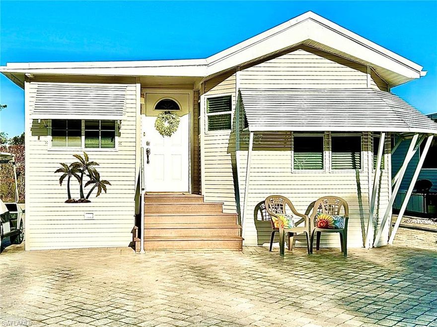 Positively Move-in Condition— this 1Br/2Ba (with the possibility of a 2nd bedroom) absolutely has it all!  Be ready to move right in and enjoy the Florida sunshine! The home has laminate plank and tile flooring, granite countertops, a large dining space, kitchen nook with storage seating, ample storage space, plenty of natural light, exterior patio pavers, attractive storm/sun shades, too many updates to mention, and is being sold furnished. Plus, the home is conveniently located near the storage area, and the nature trail and dog parks are a very short walk. This home is situated within Imperial Wilderness, a gated 55+ location where you own the land when you purchase your home. It is not leased land or a Co-Op and was never flooded or adversely affected by any recent hurricanes. Located approximately 3 miles to shopping and restaurants, 11 miles to Naples beaches, and 8 miles to Marco Island beaches, the community’s position is ideal. Additionally, airport access is easily attainable— a 45-minute drive (RSW). Maximizing the opportunity for enjoyment while economically owning land and a home in Naples, FL, the HOA fee of $898. per quarter is exceptionally reasonable. That fee covers many of your needs: the advantage of a gated community, water, sewer, lawn care, basic cable, trash, recycling, and community amenities. Community amenities include 2 pools with spas, bocce, pickleball, pétanque, tennis, shuffleboard, billiards, ping pong, a library, clubhouse, 2 dog parks (1 pet, 40lb. max.), and a nature trail. Added to this, there is an extremely active events calendar with over 100 activities available per week! If you are looking for fun and a chance to relax in paradise without doing any fix-up work, this is for you!