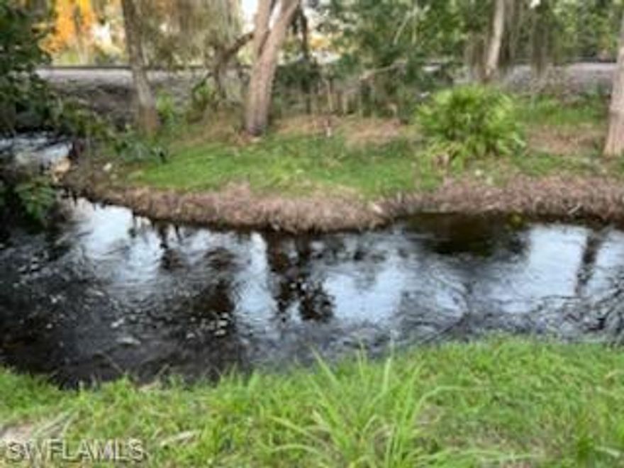 Waterfront Lot! Downtown Bonita Springs area vacant lot situated on the creek that borders Island Park and leads to the Imperial River. This home site is close to the activity hub of Bonita Springs at the Bandshell and Riverside Park, Depot Park and Island Park. Property backs to historic railroad tracks which once was used to ship citrus & lumber. Track is currently non-functioning and periodically there is chatter of a greenway or bike route. Nearby attractions include the new public library, various restaurants and cocktail bars, the Everglades Wonder Gardens plus future up and coming development projected over the next few years. Only minutes to beautiful beaches and walking distance to great fishing!