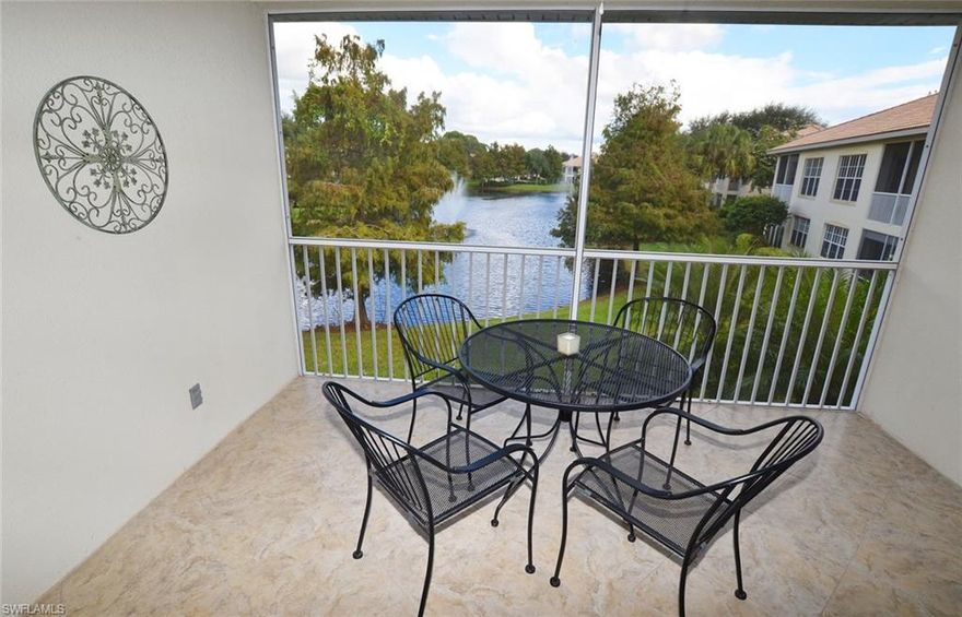 WOW! GREAT VALUE FOR PELICAN MARSH. BRAND  NEW KITCHEN STAINLESS STEEL APPLIANCES. Outstanding long lake and fountain views from this beautiful 2 bedroom, 2 bath condo with soaring ceilings and open floor plan. Granite counters in kitchen and bathrooms, tile throughout except bedrooms, new A/C 2012, new washer/dryer 2012, new tile on the lanai 2015 and the list goes on. Being sold furnished for easy move in and tastefully decorated with Robb and Stuckey furniture. Hurry this fine condo will sell fast.