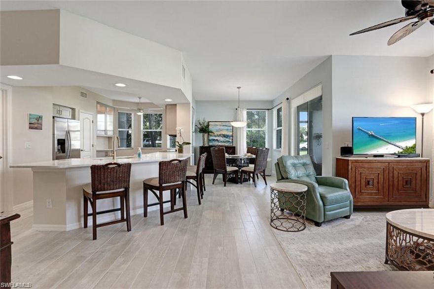 This is a long term rental 6 months + to 1 year.  Although there is furniture in the listing,  this condo does not come furnished.  Tenants cannot have pets, per the condo bylaws and rules.  This is a great 2 bedroom, 2 bath first floor unit with an attached one car garage and across the street from the small community pool.  It is in a gated community and only 3 miles to beaches, shopping, dining, etc.  Only 20 minutes to RSW and 3 miles to I75.  The kitchen is knock out as it has been totally redone cabinets, counters, appliances and flooring.  Beautiful flooring through out the condo.  This condo does have two private pools for your use.  Spanish Wells Country Club is a private facility with  27 holes of golf.  The country club does  allow outside play on a daily basis.  Some other amenities are only available with one of the different levels of memberships.