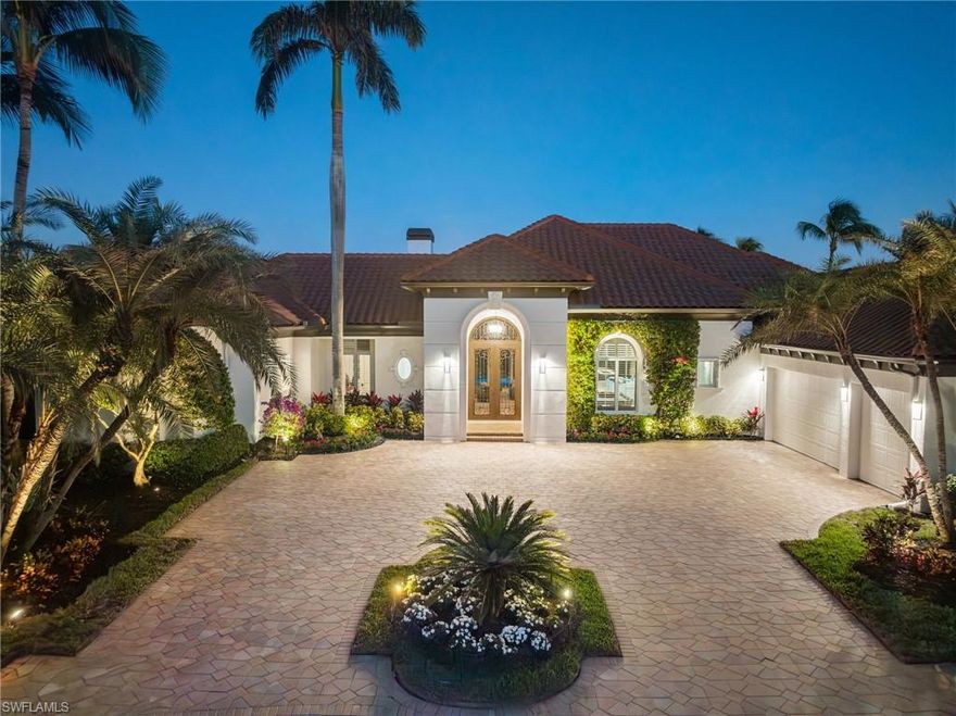 Situated on a premium cul-de-sac waterfront lot in prestigious Grey Oaks, this exquisitely renovated 4-bedroom plus study, 4.5-bathroom home spans over 4,800 square feet of refined living space. This home is a rare find and priced to sell. Offering sweeping 180-degree views of the lake and golf course, the home’s open floor plan seamlessly connects indoor and outdoor spaces, making it ideal for entertaining or enjoying Naples’ luxurious lifestyle within the exclusive Grey Oaks community. Every detail of this residence has been meticulously maintained or thoughtfully updated. The current owner introduced a high-end kitchen with Miele appliances, a custom wine room, walnut hardwood floors, and a modern fireplace. Significant updates elevate the home’s functionality and design with a new roof, gutters, and a complete A/C system replacement (still under warranty). Additional enhancements to the outdoor spaces included retractable lanai screens and a state-of-the-art security camera system. The outdoor living area was transformed in 2023, featuring a resurfaced pool, new pool deck, updated equipment, and a stunning outdoor grill area. New lanai flooring and fans further enhanced this serene space designed for relaxation and entertainment. Most recently, the primary and guest bathrooms and the powder room were updated, showcasing exceptional craftsmanship and impeccable design. The exterior received a fresh coat of paint, ensuring the home is as visually stunning as it is functional. Located in one of Naples’ most coveted communities, Grey Oaks offers an unparalleled lifestyle. Residents enjoy access to three championship golf courses, two elegant clubhouses, a poolside restaurant, tennis and pickleball courts, a cutting-edge fitness center, and more. This is more than just a home, it’s a gateway to luxurious living at its finest. A must see!