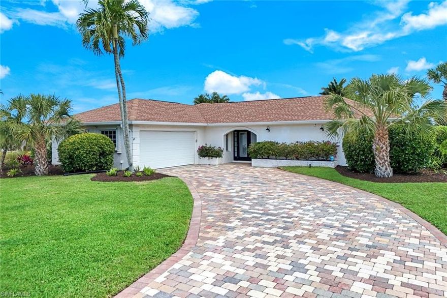 Discover a home that captures the relaxed Naples lifestyle from the moment you walk in. Nearly 1,800 sq ft of warm, inviting living space with a modern cottage character that includes French doors, refreshed bathrooms, and a bright kitchen with upgraded cabinetry, generous counter space, and newer appliances. Impact-rated windows are currently being installed in the guest bedrooms and guest bath to add comfort and confidence.

The heart of the home is the expansive screened lanai, where a picture-window pool enclosure frames peaceful views of the 11th green at Hibiscus Golf Course. It’s the perfect backdrop for morning coffee, quiet afternoons by the pool, or unwinding at sunset. A 2019 roof and 2025 A/C enhance efficiency and ease of ownership, while the split floorplan offers privacy for both owners and guests.

Located in desirable Lely Golf Estates, this property enjoys one of the lowest HOA fees in Naples at just $100 per year. Beaches, downtown dining, shopping, and Marco Island are all within easy reach, making this home an ideal retreat for those seeking comfort, charm, and a serene golf-course setting. A truly inviting place!