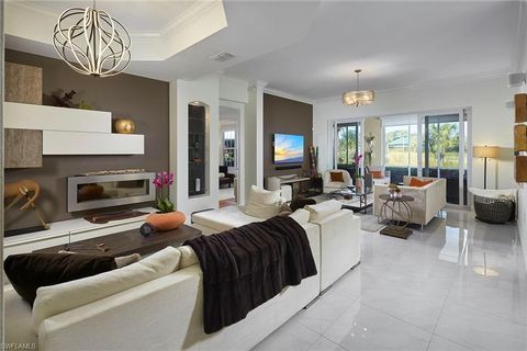 Photo of 9021 Whimbrel Watch LN #102, NAPLES, FL 34109 (MLS # 225016593)