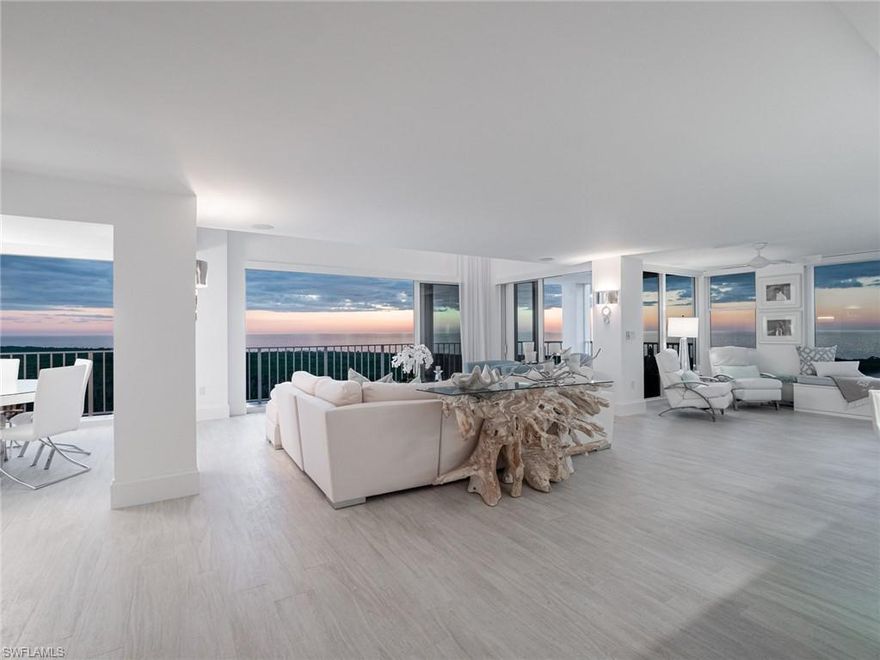 Presenting SKYHOUSE – a glamorous two-story home in the sky. Completely remade in 2015, rarely does such an exquisite offering become available. Upon entering, walls of glass provide breathtaking, panoramic, best of Naples views of the Gulf of Mexico, city lights, and stunning sunsets. Elegant modern design, an open floor plan and opulent finishes were used to create one of Southwest Florida’s most remarkable homes. A state-of-the-art chef’s kitchen features an expansive 17-foot quartzite island. Sleek custom cabinetry discretely houses professional grade appliances, and custom illumination, dry bar, and wine cooler grace this fabulous entertaining space. Family and friends can enjoy Gulf views from two luxurious suites with spa like baths plus an office that doubles as a guest room. A custom glass circular staircase leads to a 2nd floor master suite, and surround sound media room with bar. Mesmerizing views from the master suite provide a spectacular backdrop to this luxurious space finished with an oversized glass shower, quartzite vanities, and a Victoria + Albert soaking tub. Designer furnishings and fixtures, power shades, and home automation complete this magnificent home.