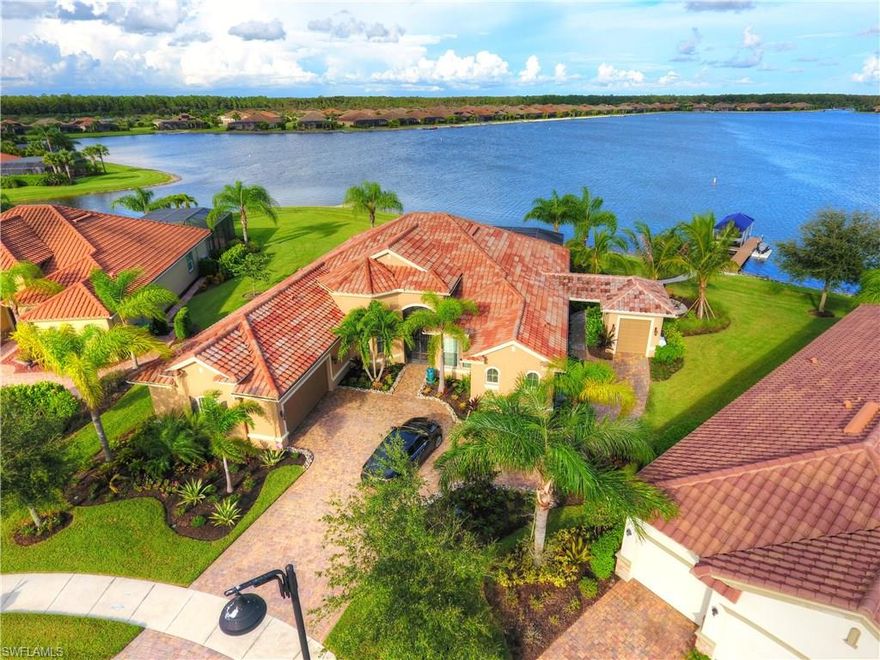 Bring your suitcase and move right in! Make this one yours and enjoy the lifestyle The Quarry has to offer. This home was professionally decorated from top to bottom, custom details are all around. The home features 4 bedrooms and a den, 2 car garage attached to home and a separate golf cart garage. The home is an entertainers dream, enjoy cooking for your guests in the outdoor kitchen, while others relax in the beautiful pool and spa. When that Florida sun gets a little too hot, relax under the custom sun shades on the lanai. Then it's time to take a boat ride straight from your own dock, the boat stays with the home for your convenience. Enjoy the two large lakes in this community and maybe even stop by the Beach Club. Then as the sun goes down gather round the outdoor fireplace and share memories.  This home truly has it all. Take your tour today.