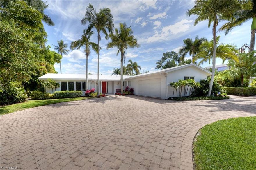 "One of a kind" Aqualane Shores waterfront property with an Old Naples location.  This charming 4 bedroom / 2 Bath house with separate 1 BR /1BA guest house is situated on a canal with direct access to the Gulf of Mexico. Includes a rare grandfathered guest house with a full kitchen, living area, bedroom and bathroom and comes complete with a screened lanai that sits at the waterfront.  Lots of options:  Use as is , renovate  and transform the house into something special, or retain the guest house and build new on this over-sized 100 x 165 waterfront lot.  The house is situated in a prime location where you can take a short stroll by sidewalk to the beach or the restaurants and shops of 3rd street.    This is indeed a rare find.