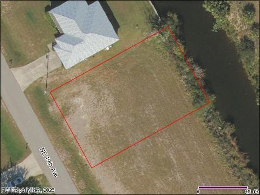 Great NE Cape Coral buildable vacant lot available on a canal! This fantastic location is on a quiet street, yet convenient to shopping, restaurants, schools, parks, and easy access to other nearby activities in Cape Coral, Ft. Myers, beaches, and Sanibel. Also easy access to other neighboring cities, the airport, or events. Don’t miss your opportunity to build your new home on this waterfront lot. This lot is priced to sell! **