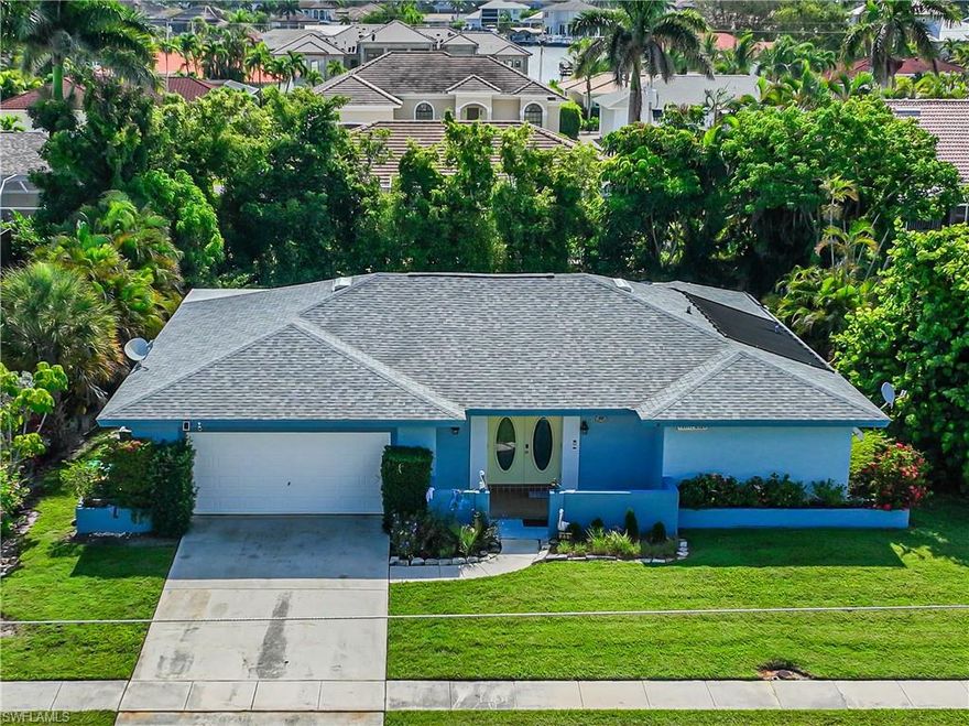 The PERFECT location for your next great investment! This charming 3-bedroom, 2.5-bath beach retreat has been beautifully updated and is perfectly furnished for more rental opportunities. This property has been a successful rental AND an amazing weekend family escape for the last many years. The closest single-family-residence to the mid-city public beach access point - JW Marriott Marco Island Beach Resort and all the best of Marco Island dining and entertainment just down the road! Inside the beach vibes carry throughout - natural light pours through the large windows overlooking the lanai and extra large pool. The split bedroom floor plan offers privacy and tranquility for all occupants. Close proximity to Residents Beach, resorts, the best shopping and dining, and even the YMCA! Don't miss the chance to own this exquisite property and enjoy the best of both worlds - a fantastic investment and a serene retreat!