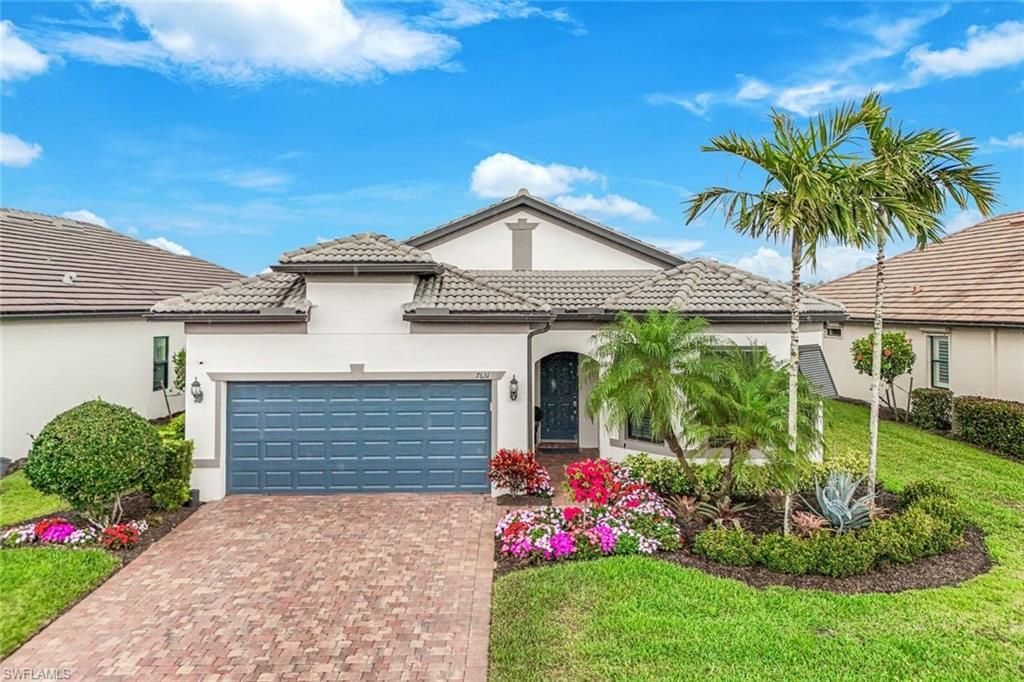 Photo of 7631 Winding Cypress DR, NAPLES, FL 34114 (MLS # 226013964)