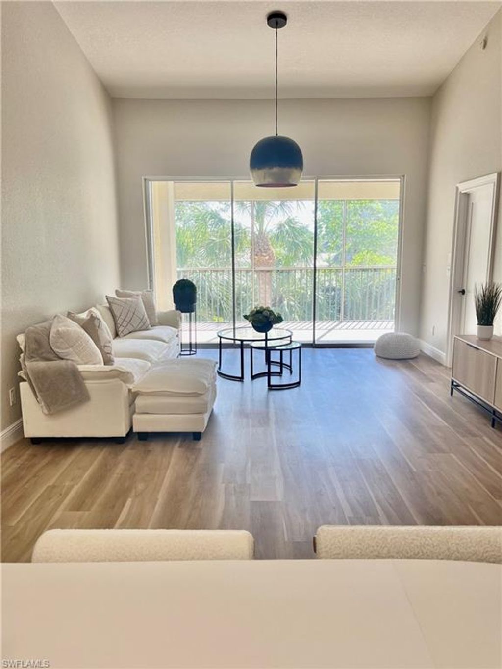 Photo of 7741 Pebble Creek CIR #302, NAPLES, FL 34108 (MLS # 226012167)