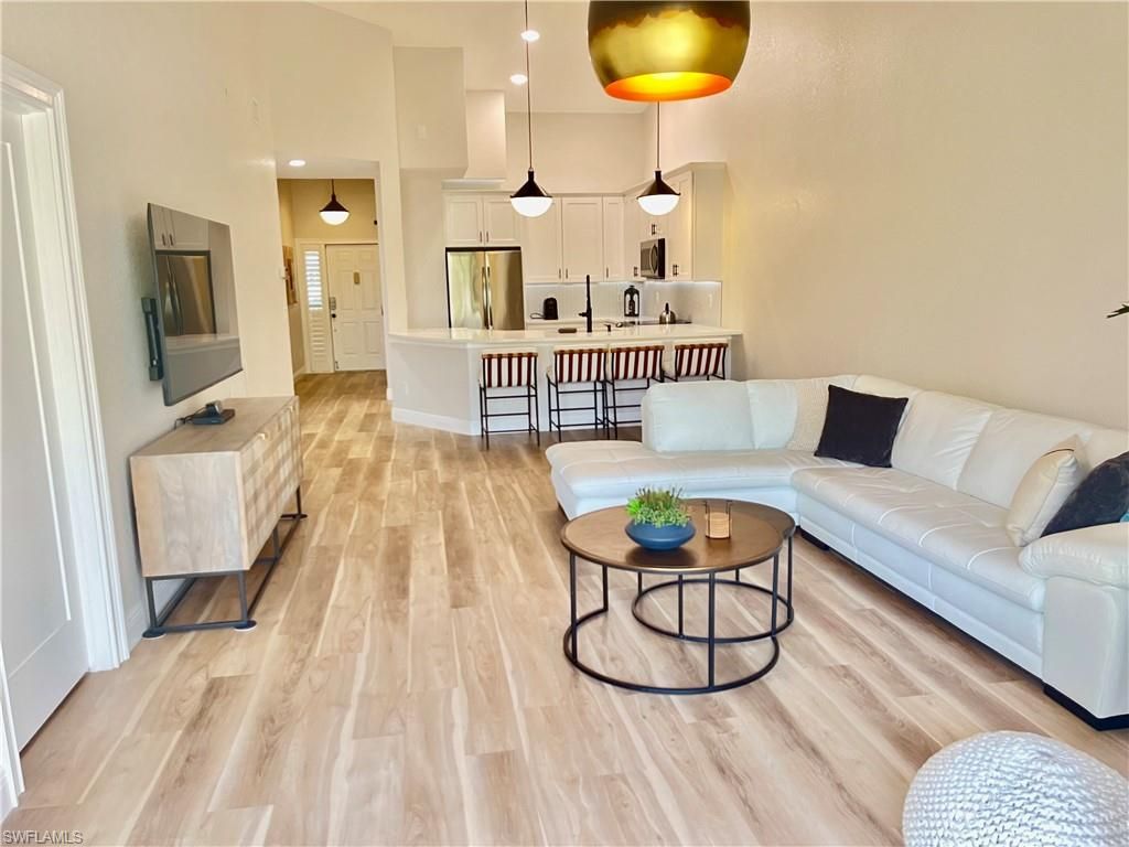 Photo of 7741 Pebble Creek CIR #302, NAPLES, FL 34108 (MLS # 226012167)