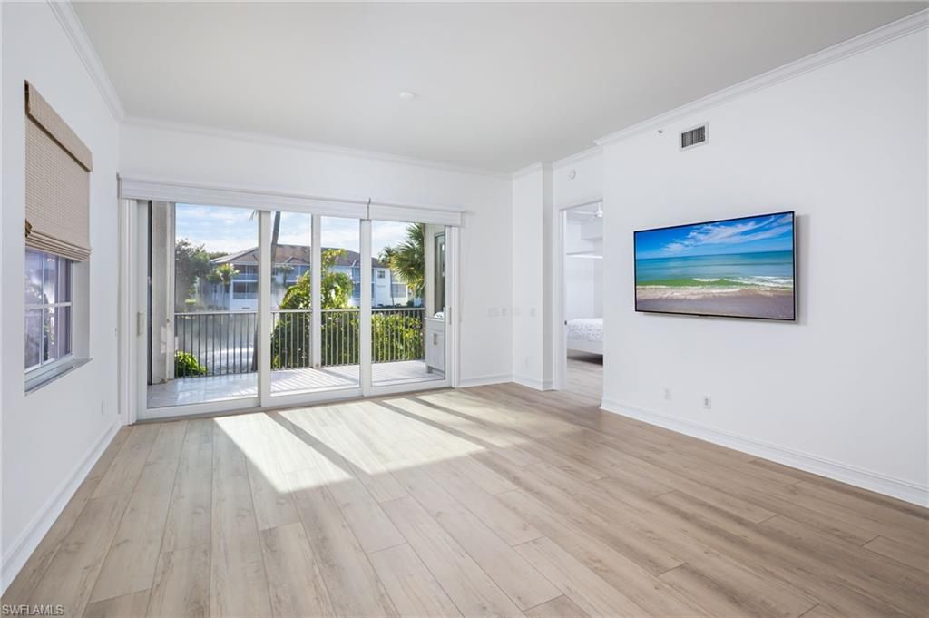 Photo of 815 Bentwater CIR #101, NAPLES, FL 34108 (MLS # 225074784)