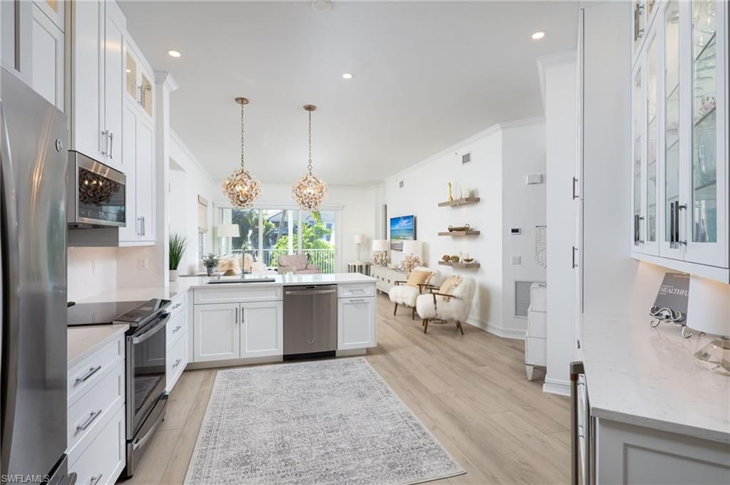 Photo of 815 Bentwater CIR #101, NAPLES, FL 34108 (MLS # 225074784)