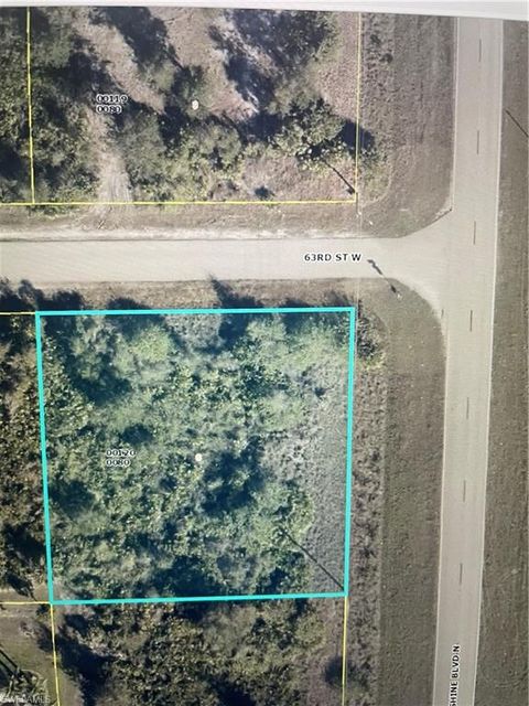 Photo of 2501 63rd ST W, LEHIGH ACRES, FL 33971 (MLS # 223086584)