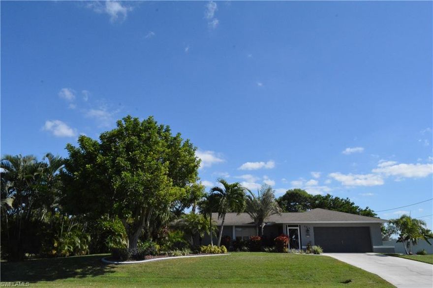 Completely remodeled inside and out. 4 bedrooms (3 with walk-in closets) and 2 full baths with guest bath access to the pool area. Updated kitchen with tray ceiling, recessed lighting, new cabinets and granite counters and stainless appliances. Updated bathrooms with new tile, new cabinets and granite counters. Large laundry room with granite counter, sink and overhead cabinets. Cathedral ceilings and custom window treatments provide wonderful ambiance in this great room open floor plan. Pocket sliders allow you to bring the outside in with a natural flow to the newly resurfaced and new tile heated pool and spa with paver decking and decorative turtles to enjoy in your salt water pool. A/C replaced in 2013 and serviced regularly. Roof replaced 2005. 
Replaced within last 18 months: Pool Heat Pump, Pool filter pump, screening, sprinkler system, privacy fence, plumbing, pool and pavers, garage door opener. 
Home shows like a model and is meticulously maintained. Surrounded by a great waterfront neighborhood.The large 3 lot site with lush landscaping provides privacy and room to park your boat or enjoy the green space. Buyer to assume balance on utilities (est. $7600) in tax bill