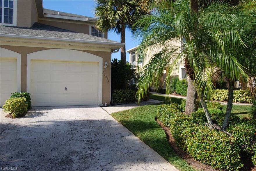 Lake View in Marsh Landing! Condo, Lower End unit sold Turnkey.  This home is 2 Bedrooms and 2 baths with attached one car garage. Bright and airy, beautiful wood floors, Kitchen and dining room, crown molding, wood cabinets, spacious Living room and electric shutters. Laundry room has a tub. Both the A/C and water heater are newer. Lovely Lake view from Lanai. with SW rear exposure. Marsh Landing is across from Coconut Point Mall. Gated community with Pool, Spa, Tennis courts, club house and more. Move in Condition. Make this your next home or your home away from home.  Call for a private showing.