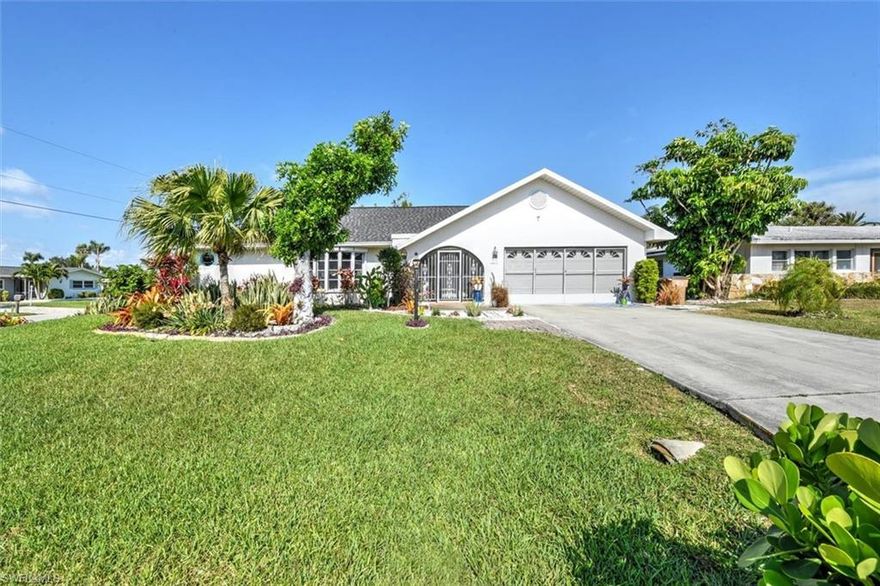 NEW ROOF (March 2023), newer AC/HEAT (2022), and resurfaced POOL (2021)(with full spectrum underwater pool LED lighting) on this spacious tropical paradise home. Clear door sliders separate the huge undertruss lanai sitting area from the pool area. A true tropical retreat with lush landscaping all around, fruit trees, and FENCED backyard. Situated on an OVERSIZED CORNER LOT that DOES NOT require flood insurance! Screened door sliders to the garage offers privacy. Roll-down hurricane shutters on lanai door sliders and windows throughout the house. All new kitchen cook top, LG
refrigerator, dishwasher, and washing machine. Other great features include split bedrooms, vaulted ceilings, and automatic landscape lighting. Hurry! This is a great home conveniently located in SE Cape and walking distance to some of the restaurants, shopping, and entertainment in Downtown Cape Coral. ALL REASONABLE OFFERS CONSIDERED. SELLER IS MOTIVATED.
