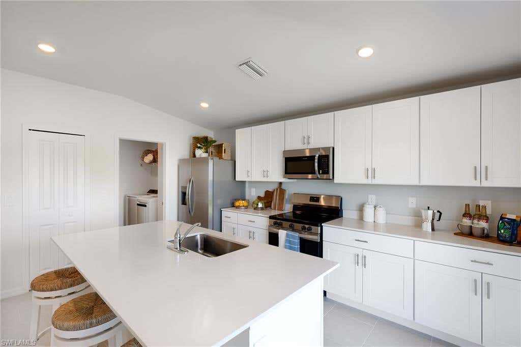Photo of 718 Kehosha AVE, LEHIGH ACRES, FL 33974 (MLS # 226027058)
