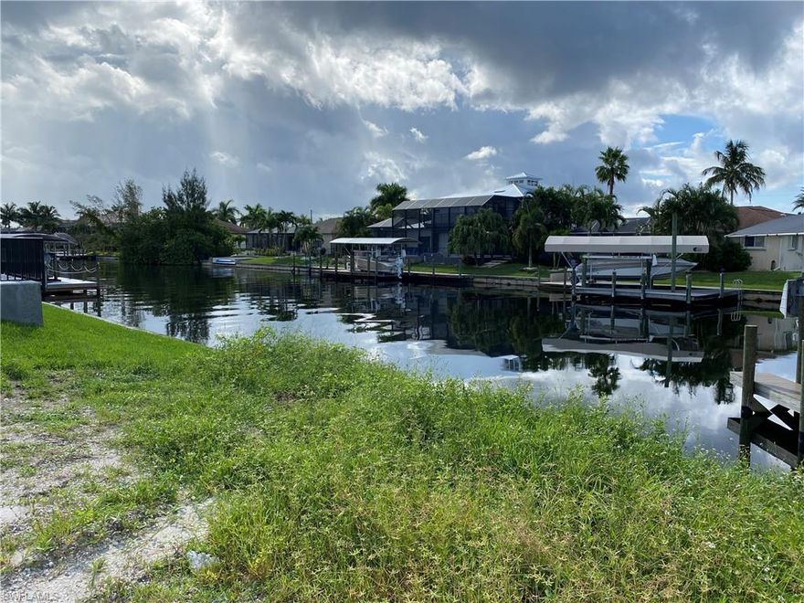 RARE OPPORTUNITY - GULF ACCESS WATERFRONT LOT WITH SEAWALL ALREADY IN PLACE AND READY TO BUILD - SURROUNDED BY MILLION DOLLAR HOMES. On the south end of Surfside Blvd. is where you’ll find this beautiful gulf access building lot. You’ll have preferred southern exposure with a seawall already in place on a 110' wide canal. All water and sewer assessments are paid in full. Make an offer today before its gone!