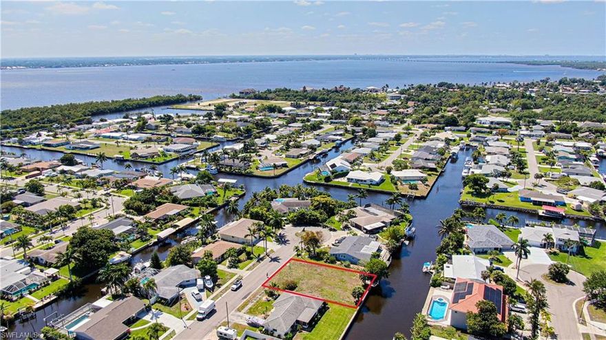 Build your dream waterfront home on this prime North Fort Myers Gulf-access lot or hold as a future investment! Tucked away in a quiet, beautiful area, this property is truly a hidden gem—offering peace, privacy, and that laid-back Florida lifestyle everyone is searching for. Enjoy direct access to the Gulf of Mexico with just a quick 10-minute ride to open water, and the river making it a boater’s paradise. The route out is just as exciting as the destination, with your boat ride passing by new and upcoming waterfront developments, including restaurants you’ll be able to dock at and enjoy right from the water. This lot is already equipped with a seawall and concrete dock, saving you time and significant upfront costs. Plus, with western exposure, you’ll experience breathtaking Florida sunsets. Whether you're planning a custom home, seasonal getaway, or investment property, this lot offers the perfect blend of location, convenience, and lifestyle.