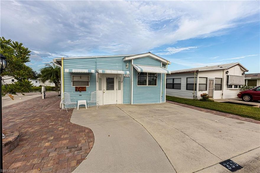 This one is a jewel! Most of the work has already been done!  It has the possibility for 2 bedrooms as the laundry room is large enough to accommodate a murphy bed.  The laminate floors throughout will make cleaning a breeze and give you lots of time to spend on the beautiful paver patio overlooking a small lake.  You can enjoy the beautiful sunrises that only SW Florida has to offer as the patio is on the SE side.  The home will be mostly furnished with the homeowners taking a few personal items.  You will even have a bonus room right next to the entry door that is a decent sized workshop and neat as a pin!  Come check this little gem out!