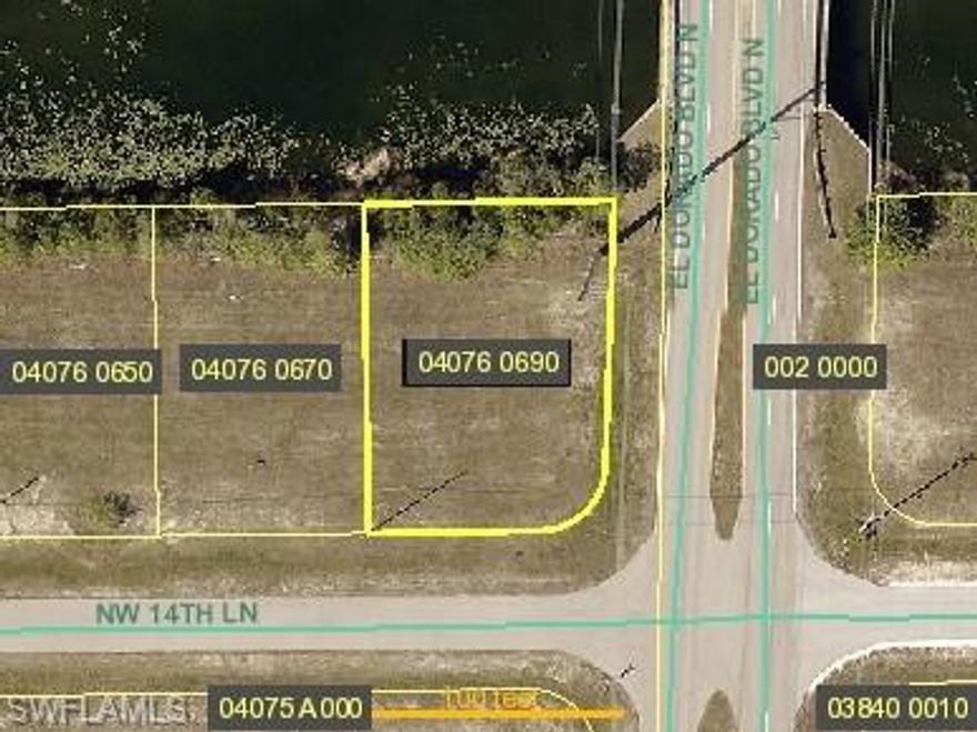 ***GREAT PRICE & LOCATION*** OVERSIZED CORNER COMERCIAL LOT *** On fresh water canal. With this market craze this one won't last. Oversized lot ready to build your new OFFICE OR STORE, located in a desirable always evolving area of one of the cities with the fastest growth rate in the nation.  On a main road with lots of traffic per hour.  Prices will keep rising as the city expands, grab your piece of the cake. MAKE YOUR OFFER NOW!