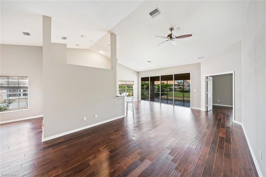 Code C2417 Fabulous three bedroom lake front condo in Naples ready for a new owner!  Beautiful engineered wood floors throughout living areas and into the master bedroom.  Two further bedrooms one with new carpet.  The master bathroom has been remodeled with a seamless glass shower, dual sinks, quartz counter, accent tiling and plenty of storage.  Every inch of the spacious walk in closet has been utilized!  The master also includes a walk mounted TV, soundbar and subwoofer. The home has two lanais, the main one overlooking the lake and fountain off to the side. The kitchen has wood cabinets, granite counters, stainless dual bowl sink and stainless LG fridge.  A/C new in 2020. Carlton Lakes is in a great location off Livingston Rd, so quick access to the beaches, Mercato and downtown Naples to the south and north to Coconut Point Mall and RSW and of course Seed to Table is in easy walking or biking distance. The condo has use of a community pool as well as the Har-Tru tennis courts, main swimming pool, bocce courts and a fitness room.  Welcome Home!