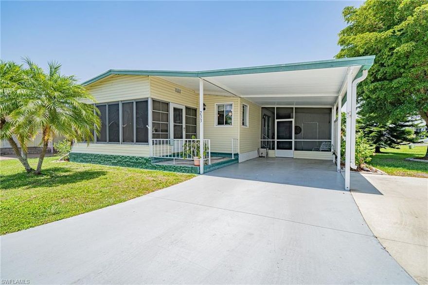 OVER $40,000 IN UPDATES & IMPROVEMENTS! Come check out this beautifully remodeled open concept manufactured home in Alligator Park. Removal of an interior kitchen wall creates an open inviting space that is both easily accessible and entertaining friendly. The kitchen has new soft close cabinets, granite counter tops and spacious island with beautiful new light fixtures. Both bathrooms have been completely renovated, including a master en-suite with a huge walk-in master shower that will make you feel like your staying in a luxury hotel. All new laminate flooring throughout the whole home ties the space together perfectly. Other new items include a new washer, dryer, water heater, built-in microwave. The home is a double wide unit with enclosed lanais, covered parking, space for storage or workshop. PRICE INCLUDES PARK SHARE OF $31,000 in this 55+ community. Your social life can be as active as you desire with numerous park activities. Low monthly fees that include your water, sewer & lawn care and other amenities, including a community pool. SELLERS ARE ALSO OFFERING A ROOF REPLACEMENT CREDIT UPON CLOSING, PROVIDING THE NEW OWNERS WITH A LIFETIME TRANSFERABLE WARRANTY.