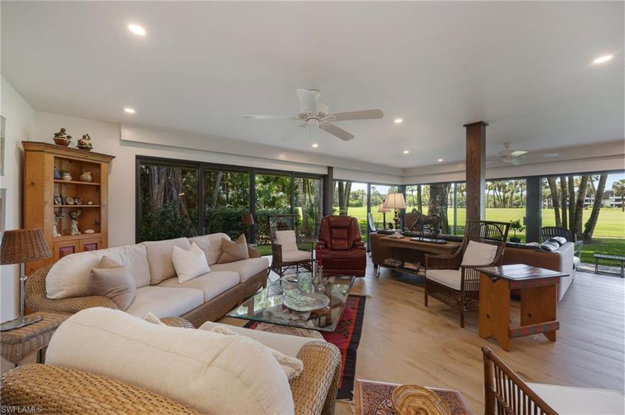 A Golf Enthusiast’s Dream!!! Immediate Full Golf Membership at closing in addition to the real property. This rarely available first-floor, 3-bedroom, 3-bath residence offers an exceptional layout, featuring a unique his-and-her master bath design. Perfectly positioned with expansive southeastern exposure, the home is bathed in natural light and showcases sweeping golf course views from a large wraparound patio, surrounded by lush, manicured grounds. Impeccably maintained and thoughtfully upgraded, this residence is rich with custom features, including elegant kitchen cabinetry, a stylish backsplash, hardwood flooring, and a custom built-in seating area that enhances both comfort and functionality. The reimagined master suite is a true retreat, offering dual full bathrooms and generous closet space, combining luxury with everyday convenience. Included with the property are a golf cart and cart garage, conveniently located adjacent to your assigned covered car parking. This gated paradise is situated within a 200-acre forest, boasting stunning landscaping and mature trees lining the roadways. Residents enjoy unlimited access to an 18-hole Arthur Hills course, 5 Pools, 4 tennis courts, bocce, croquet, and a dog park. Residents have exclusive access to the newly constructed state-of-the-art 5-star Clubhouse with lunch daily, with a creative chef’s menu. Just minutes away from the vibrant shopping and dining destinations of 5th Avenue and Old Naples, this exceptional condominium offers a lifestyle of luxury and leisure. Purchase of a Wilderness Country Club membership is required and readily available to elevate your living experience.