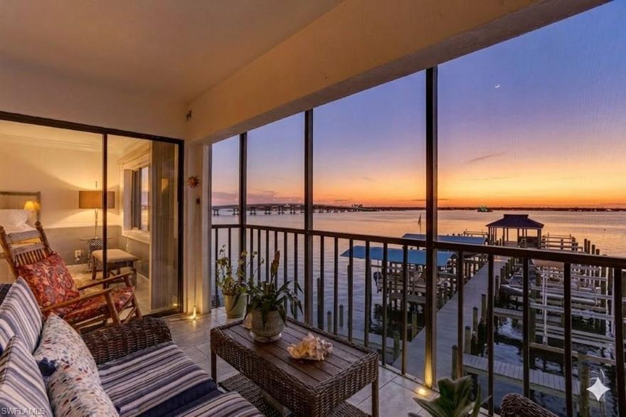 Welcome to Marina Terrace, one of Downtown Fort Myers’ best kept waterfront secrets where riverfront living, boating convenience, and walkable city lifestyle come together. This beautifully positioned 4th-floor residence offers sweeping views of the Caloosahatchee River, where each evening ends with spectacular Southwest Florida sunsets and mornings begin with boats passing quietly along the water. From the comfort of your lanai, watch dolphins play in the river or simply enjoy the peaceful rhythm of waterfront living. What truly sets this property apart is something incredibly rare in downtown Fort Myers: your own deeded boat slip with direct Gulf access. Step out to the dock, untie the lines, and spend the day exploring Sanibel, Captiva, or cruising the Caloosahatchee River. For boating enthusiasts, this is an opportunity that rarely becomes available. Inside, the 2-bedroom, 2-bath split floor plan offers over 1,201 square feet of comfortable living space with thoughtful updates including new kitchen countertops, a newer A/C system, water heater, a kitchen water softener system, and an automatic hurricane shutter on the lanai for convenience and peace of mind. Marina Terrace is a boutique riverfront community with only 20 residences, creating a quiet and private atmosphere rarely found this close to the city center. Residents enjoy a gated entry, elevator access, indoor heated pool, fitness room, and covered parking. The community’s newly rebuilt composite docks and pilings have restored the waterfront amenities, ensuring years of enjoyment ahead. Location is another standout feature. From your front door, it’s just a short walk to Downtown Fort Myers’ vibrant River District, where you’ll find waterfront restaurants, live music, art galleries, theaters, boutique shopping, and year-round events. Whether you're searching for a primary residence, winter retreat, or boater’s escape, this property delivers a rare combination of waterfront views, private boat access, and downtown convenience. Come experience the lifestyle that makes this property truly special.