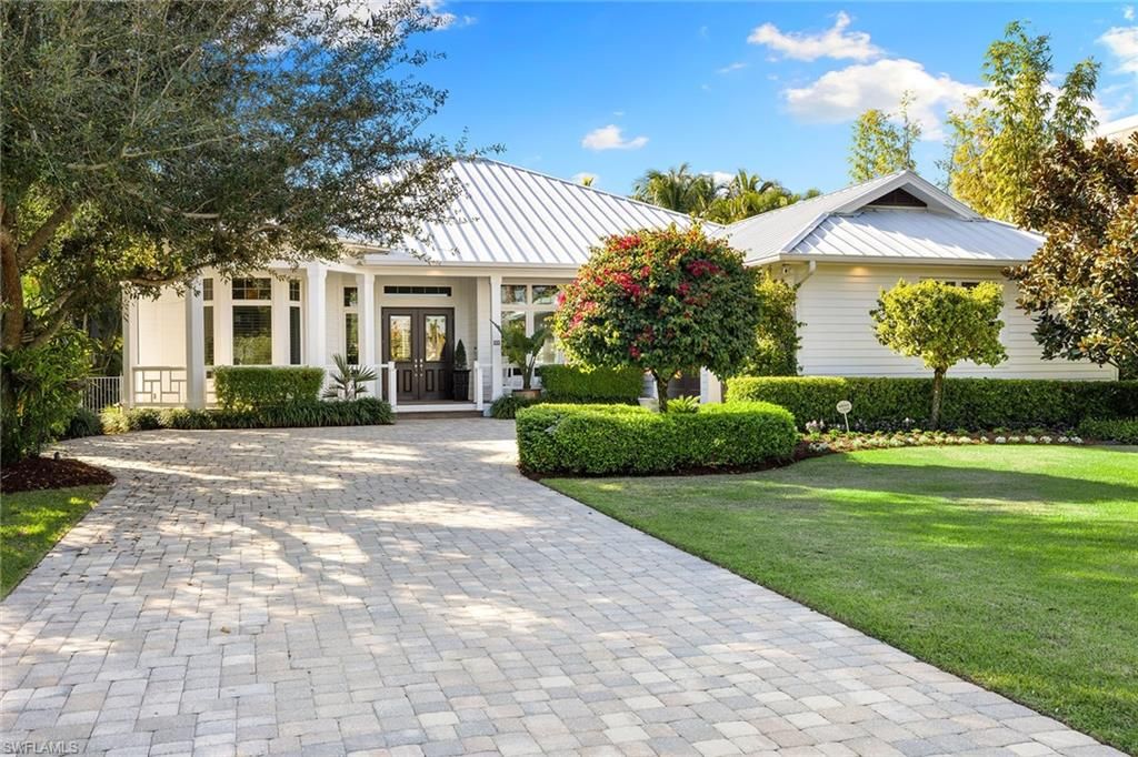 Photo of 642 Bougainvillea RD, NAPLES, FL 34102 (MLS # 225074461)