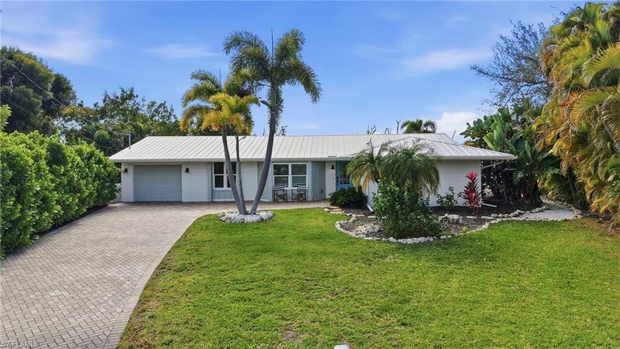 Schedule your showing today to experience the true island lifestyle at 1806 Ibis Lane! Tucked away on a quiet cul-de-sac, this waterfront 3 bedroom, 2 dens, 2 bathroom home overlooks Sanibel-Captiva Conservation land, offering a serene setting where nature and coastal living come together and the birds are always chirping. This is not staged; what you see is what you get- fully furnished! Enter into a thoughtfully designed space with a well-balanced layout. The fully appointed kitchen features top-of-the-line appliances and premium finishes. The primary bedroom is thoughtfully tucked away and features timeless finishes, generous space, and a walk-in closet. Both guest bedrooms are generously sized. Spend as much time as you’d like enjoying the coastal breeze from the patio, which offers ample space for dining and lounging while taking in abundant wildlife views. Land survey available upon request, with room for a pool. Must know items: impact windows and doors throughout, 10 Ton A/C 2024, water heater 2023, and a metal roof installed in 2017. Located mid-island, the property is conveniently close to multiple beach access points. Hop on your bike and head to the beach, nearby parks, dining- or simply stay home and enjoy island living at its finest!