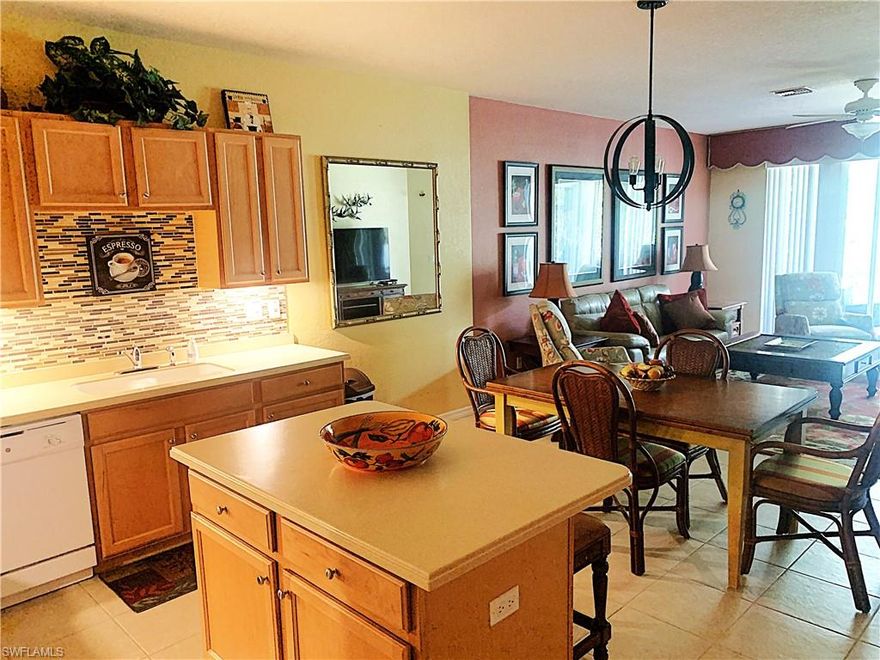 This custom, Coastal-designed condo is MOVE-IN READY! It is offered TurnKey so moving in is hassle-free. Reflection Key is a gated community with private access to Lakes Park. This is an ELEVATED FIRST FLOOR condo with over 1,500 sq ft, a locked exterior STORAGE ROOM, 2 Bed + Den & 2 full baths with tile flooring throughout and carpet in the bedrooms. The lovely Den with French doors is done in a stunning blue accent wall with leather recliners. The owners Suite offers a soaking tub, two vanities, step-in shower, private toilet, and walk-in closet. Privacy is provided by the SPLIT BEDROOM FLOOR PLAN and tropical landscape view from the elevated, screened lanai. Design decor items include decorative potted plants, pottery, mirrors, wall hangings, vases, platters and silk plants. The kitchen has glass backsplash, Corian counters, and working Island which makes for COMFORTABLE ENTERTAINING. There is PRIVATE ACCESS to the 279-acre LAKES REGIONAL PARK! You can ride or walk there to enjoy paved & limestone trails, boat rentals, bike rentals, raised garden beds and WEEKLY FARMERS MARKET during season. Or stay at home and enjoy Reflection Key’s active lifestyle with outstanding amenities, including: 
 • Heated resort-style pool and spa 
• Tennis and pickleball courts 
• Clubhouse with fitness center, billiards, and library
 • Playground and community gathering spaces
 • Regular social events, coffee gatherings, luncheons, and seasonal celebrations.  

Reflection key is located in prime, Old Florida territory on Summerlin Road. Only 20 MINUTES TO RSW, easy access south to Sanibel and Captiva or north to downtown Fort Myers. Downtown Ft. Myers offers year-round, twice a month, ‘close-down-the-streets’ events with Art Walk and Music Walk the 1st Friday and 3rd Friday of each month. This condo is really one of THE BEST VALUES in Reflection Key. Make us an offer . .  you won't be sorry!