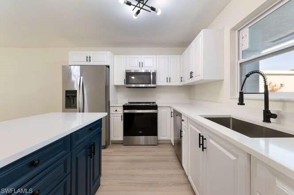 Photo of 2180 Leisure LN, FORT MYERS, FL 33907 (MLS # 225082945)