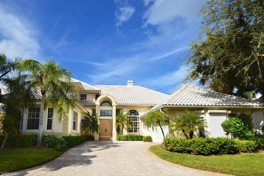 V.2196 - Dynamic long lake views and carefree living in this beautiful luxury villa. From the “wow” lake view when you enter the front door, the spacious floor plan flows easily from all areas of the home to the tropical lanai with rock waterfall.  Delight in the 3 bedrooms, expansive den with built-in cabinets and shelves, 4.5 baths, volume ceilings, abundant natural light, large tile, wood and carpet floors. Updated kitchen with island, granite counter tops, built-in wine cooler, adjoining butler's pantry and spacious family room open to the kitchen and lanai.  The second level guest area features 2 guest bedrooms each with en suite baths and adjoining sitting area.  The resort style sunny lanai boasts a heated pool and spa and an outdoor kitchen with gas grill.  Home has a 3 car garage and hurricane protection on most openings. For carefree living, the Sanctuary HOA has responsibility for exterior landscaping and weekly pool care.