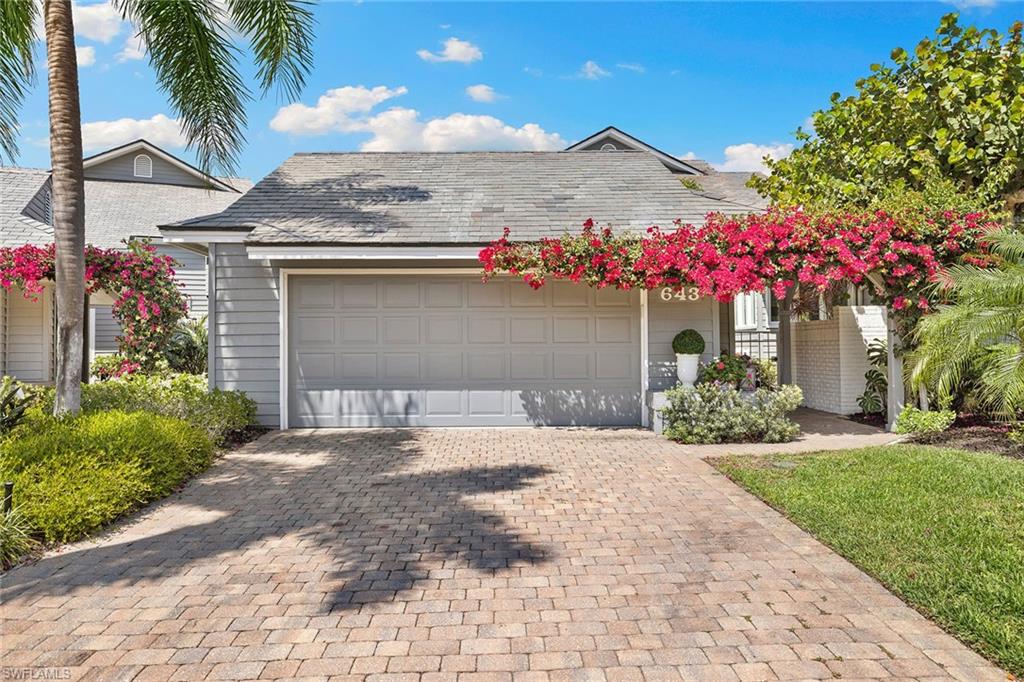 Photo of 643 Bridgeway LN, NAPLES, FL 34108 (MLS # 226035970)