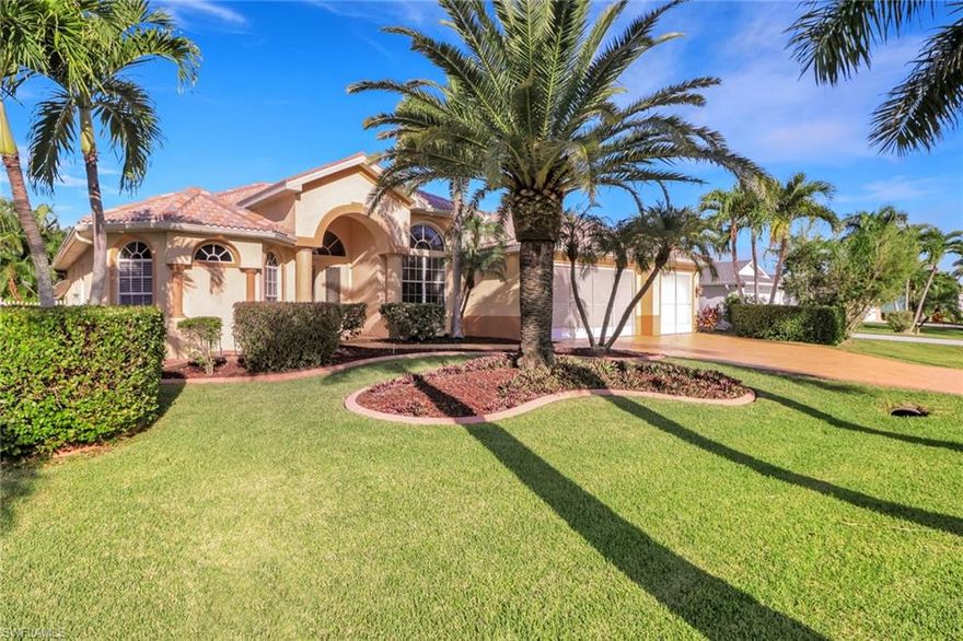 Price reduction on this 2,943 sf two story concrete block stucco home in a beautiful highly maintained and desired neighborhood. Three bedrooms downstairs, each with their very own full bathroom and very own walk in closets, also a fourth large loft/bedroom/bonus room upstairs with its own full bathroom and walk in closet, and a balcony to view the beautiful Florida sunrises and sunsets. Also a downstairs office/den with French doors that can be a fifth bedroom. Dining room has a 14 ft ceiling with mood lightning in the stunning tray ceiling. Also a separate dining area off of the kitchen with a large view of the pool, lanai and yard. The living room has 12 ft ceilings with large built in shelving. A high end crystal chandelier dazzles above. Inlay engineered tile and hard wood flooring in the living room. Soaring tray ceilings and crown molding throughout the home. The large primary bedroom has tray ceilings, two closets, one with built in shelving/organizers, French door to the lanai/pool. Primary bath has dual sinks, spa jacuzzi tub, and dual shower heads. Well-appointed kitchen with plenty of cabinetry, counter space, breakfast bar, central island working space, recess lightning and self cleaning convection oven with a generous walk in pantry. Stunning glass double entry doors. Beautiful outdoor concrete pool with heavy duty plumbing in 2023.Convenient 1/2 pool bath in pool/lanai area and three doors leading to the pool/lanai. A three car garage with paver driveway. Nice architectural details throughout the home and a surround sound system. Has only been owned by one family and well maintained. Perfect for a family, vacation home or investment property, no HOA. Not a far drive from top-rated schools, entertainment, dining, shopping and Sands Park. Interesting architectural details throughout the home. A 16 seer 5 ton Rheem system unit Dec 2019/10 year warranty. Fan replaced 2024.House wired for security system. Beautiful tile roof. Automatic lawn irrigation system. Beautiful curb appeal with tropical Christmas palm trees and Canary date palm trees line the street. Mature lush landscaping, manicured bushes. Backyard has avocado, mango, and papaya trees and a Maranga tree. Offers luxury and comfort for the ultimate Florida lifestyle. Stunning lighting around the home for a relaxing peaceful appearance. Furnishings are negotiable.