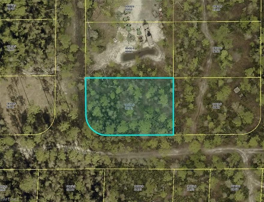 Discover the perfect opportunity to build your dream home on this vacant corner lot located in the quiet, growing area of North Fort Myers. Situated on an unimproved road, this property offers added privacy and a blank canvas to design exactly what you envision. The lot will require well and septic, giving you full control over how your utilities are set up. Enjoy being just minutes from several golf courses and country clubs, making it ideal for those who love an active Florida lifestyle. Whether you're looking to build a full-time residence, seasonal retreat, or investment property, this location provides peaceful surroundings while still being close to local amenities, beaches, shopping, dining, and more. Don’t miss this chance to create your own piece of paradise in beautiful North Fort Myers!