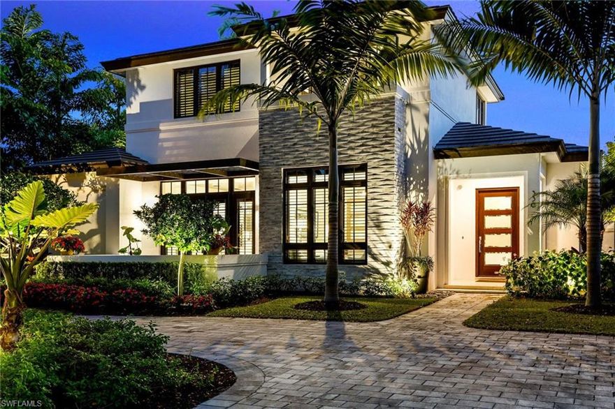 Magnificent Olde Naples 2-story residence with a true architectural presence both inside and out. Located on a spectacular Mahogany tree canopied street only 3 blocks to the beach. 4 bedroom + study + loft / gathering area, southern exposure, 3-car garage, generator. Guaranteed to delight! Thoughtfully detailed interior & exterior finishes / elements are far too many to mention though you can look forward to wide oak plank flooring, stunning 1st floor master suite opening onto lanai with captivating master bath including private outdoor shower area, wonderfully outfitted lanai includes motorized screens as well as summer kitchen & linear gas fireplace, 1st floor study with custom built-in cabinetry, sunny pool area, lush mature tropical landscaping, ceilings accented with planking & beams, maximized privacy & natural lighting. All guest suites are on the 2nd floor which offers large sunny open air terrace plus welcoming open gathering area. This residence has so many different areas & environments to enjoy for virtually any & all lifestyles. Walk or bike 6 blocks to 5th the Avenue South's shopping / dining - Cambier Park too. Ideal for both seasonal & year round living.