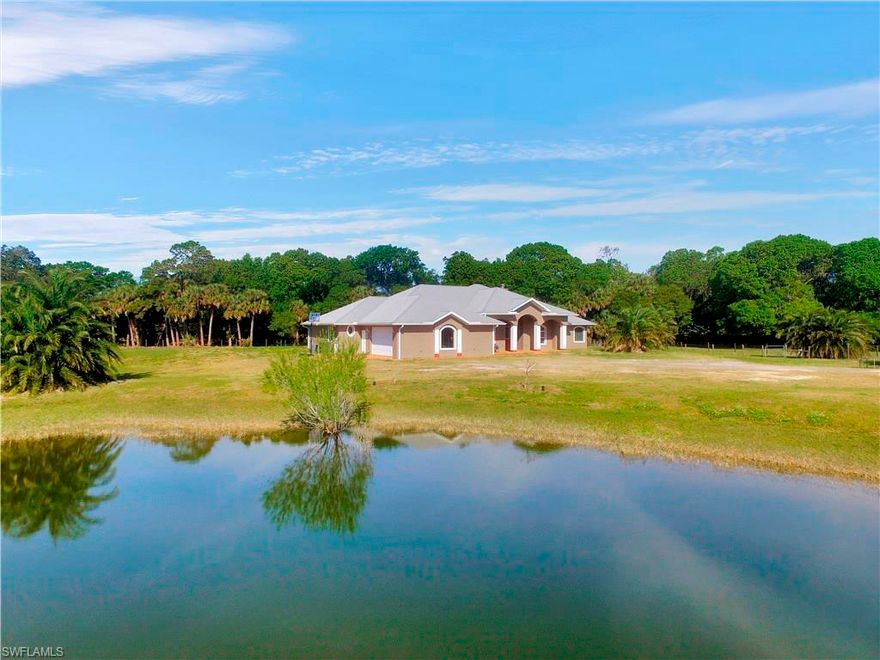 Relax, Play, Work!!!!!!!  With over 10 acres of land you can do whatever your heart desires!!  This beautiful property has everything to offer.  Main home has over 3,000 sf of pristine living, 2 large workshops for all your business/hobby needs, Popash Creek runs through the rear of the property loaded with wildlife, pond in the front, and much more.  Please check out the pictures and virtual tour to get a taste of this spectacular property.  Call today for your private tour!!!