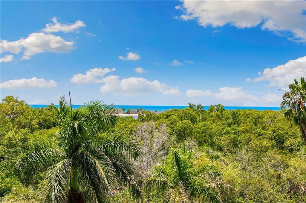 Photo of 5501 Heron Point DR #303, NAPLES, FL 34108 (MLS # 225066355)