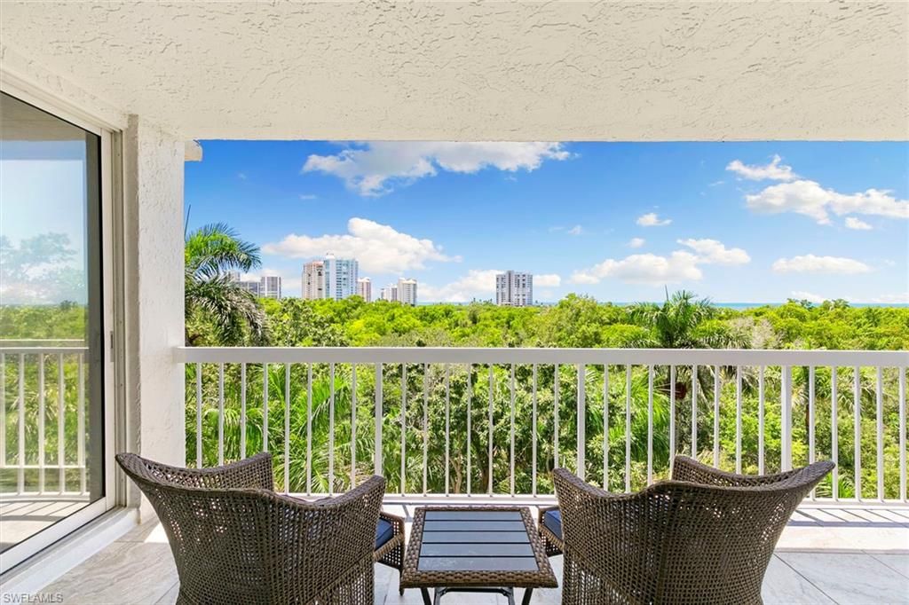 Photo of 5501 Heron Point DR #303, NAPLES, FL 34108 (MLS # 225066355)