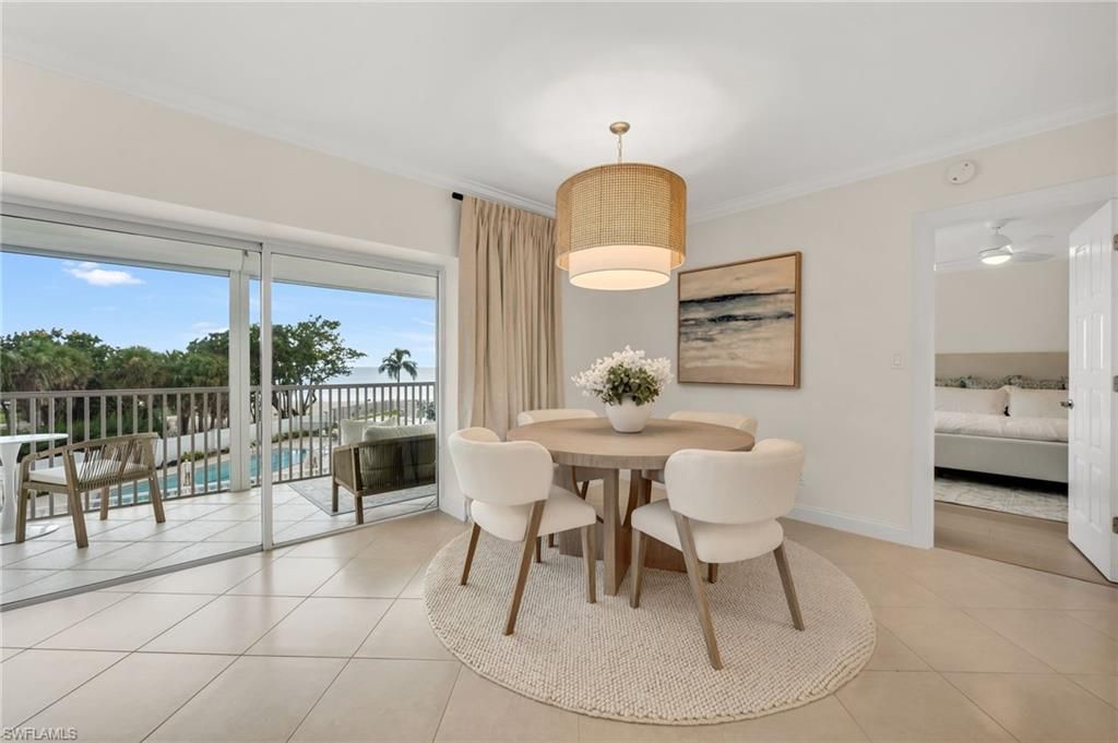 Photo of 3401 Gulf Shore BLVD N #205, NAPLES, FL 34103 (MLS # 225066511)