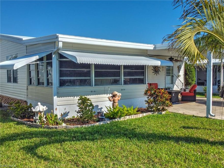 TURNKEY furnished, this property has been meticulously maintained and is ready for immediate move-in. Enchanting Shores is a friendly community with great amenities and even better neighbors! Perfect for a seasonal or full-time residence and is conveniently located within 15 minutes of Marco Island OR downtown Naples. Truly a MUST SEE, lives more like a single family home inside than a manufactured home. AC is brand new, as well as new insulation and ductwork. Washer and Dryer in unit. This community does have boat storage and a boat ramp that leads out to the gulf in about 45 mins.