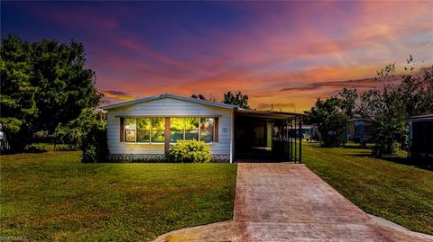 Photo of 7627 Peyraud DR, NORTH FORT MYERS, FL 33917 (MLS # 225079303)