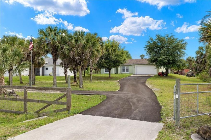 Amazing opportunity to OWN a 3 bedroom 2 bath concrete block home on 1.59 cleared and dry acres in Golden Gate Estates, NAPLES FL for UNDER 500K! No HOA. Kitchen and baths have granite, whole house water filtration system, laundry in the house. This property has NO carpet all laminate and tile, 2 car garage, above ground swimming pool with walk up deck, and a hot tub, Open Kitchen, WOW! Sit on your screened lanai over looking your preserve and watch deer in the morning and the occasional bear cub! Plenty of room for another house/mother-in-law home, tiny home and/or Pole Barn in fact there may be enough room for all of it. House also has a container for extra storage. Full Home Warranty is available.
