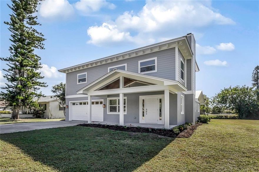 Completely Remodeled Direct GULF ACCESS Home in Fort Myers Shores with 2 Masters! The 2nd Master Suite on Ground Floor could also be used as a Home Office or a Remote Leaning / Working Area... a Perfect "COVID" Ready Home! EXTENSIVE $200K RENOVATION (2019-2020) INCLUDES: New 5V Metal Roof, Hardie Board Soffit, Open Gable Porch Addition, Stucco, PGT Impact Rated Windows/Doors, New Electrical Panel + Wiring, PEX Plumbing, Drywall, All New Flooring * Fixtures * Paint * Stairs * Doors * Trim * Cabinets * Baths * Kitchen + More! Designer Kitchen features white solid wood cabinets w/ dovetail construction and soft close drawers, quartz countertops w/ Carrara marble effect veining, stainless steel Whirlpool appliances and a pantry. To one side, a generously sized laundry room with sink and matching cabinetry lead to the finished 2-car garage. To the other, Impact Rated double doors open up to your Southern Exposure patio. Your own private wood dock on the canal is the perfect place to unwind after a long day, fishing pole in hand. Plenty of room to build a pool, add a seawall or expand the dock. Seller also owns adjacent parcel and will offer 1st right. Call today for a list of upgrades!