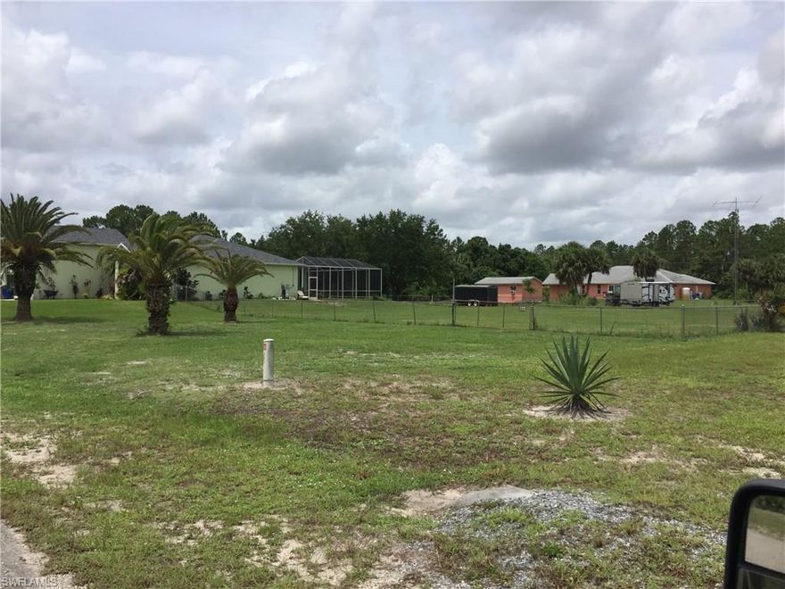 Beautiful oversized lot in a very nice neighborhood in Lehigh Acres ! This lot is 105 x 208 , 0.5002 acres and is on a paved road. Lot is cleared and ready for you to build your dream home ! Bring your offer today! Come enjoy Florida living and weather!