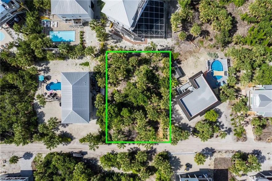 Build your island retreat on North Captiva Island with this rare opportunity to own a buildable homesite surrounded by lush tropical vegetation and natural coastal beauty. Tucked within a peaceful, unspoiled setting, this lot offers the ideal foundation for a private getaway where life moves at an easier pace. Miles of pristine white-sand beaches and the sparkling waters of the Gulf of America are just a short walk or golf cart ride away, perfect for days spent swimming, shelling, boating, or simply enjoying unforgettable sunsets. The property is conveniently located near resort-style amenities, including optional membership to the North Captiva Island Club, offering access to pools, dining, and island activities. Known for its laid-back lifestyle, limited access, and Old Florida charm, North Captiva remains one of Southwest Florida’s most treasured hidden gems. Create the island home you’ve always envisioned and embrace a lifestyle defined by nature, privacy, and coastal simplicity.